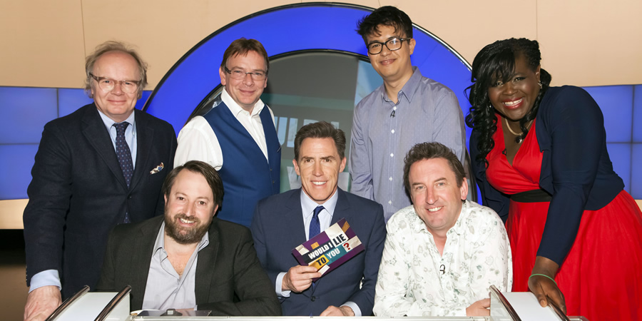 Would I Lie To You?. Image shows from L to R: Jason Watkins, David Mitchell, Adam Woodyatt, Rob Brydon, Phil Wang, Lee Mack, Maggie Aderin-Pocock. Copyright: Zeppotron