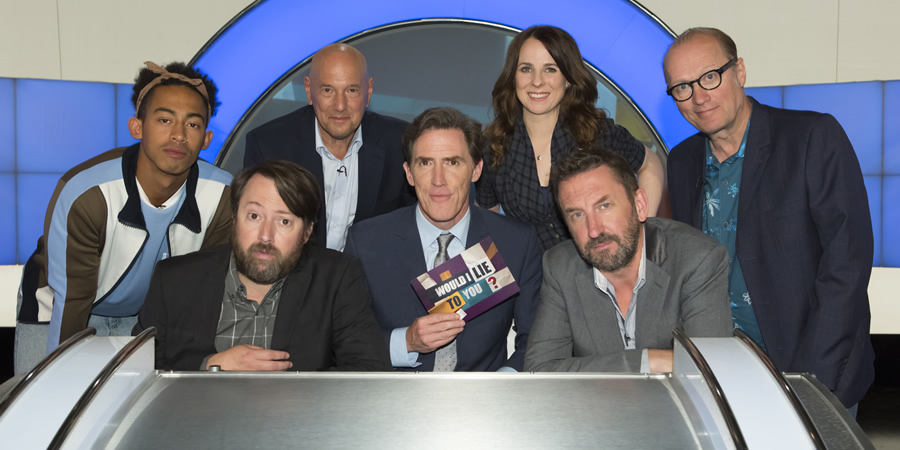 Would I Lie To You?. Image shows from L to R: Jordan Stephens, David Mitchell, Claude Littner, Rob Brydon, Cariad Lloyd, Lee Mack, Adrian Edmondson. Copyright: Zeppotron