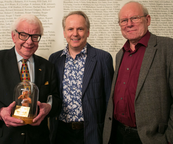 Barry Cryer receiving the Aardman Slapstick Comedy Legend Award. Image shows from L to R: Barry Cryer, Nick Park, Graeme Garden