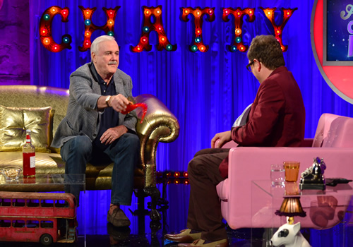 Alan Carr: Chatty Man. Image shows from L to R: John Cleese, Alan Carr. Copyright: Open Mike Productions