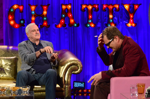 Alan Carr: Chatty Man. Image shows from L to R: John Cleese, Alan Carr. Copyright: Open Mike Productions