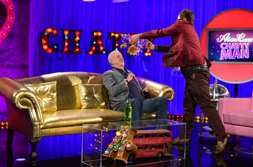 Alan Carr: Chatty Man. Image shows from L to R: John Cleese, Alan Carr. Copyright: Open Mike Productions