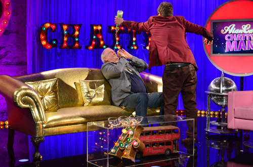 Alan Carr: Chatty Man. Image shows from L to R: John Cleese, Alan Carr. Copyright: Open Mike Productions