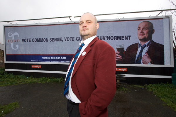 The Pub Landlord v Nigel Farage: The Battle For South Thanet. The Pub Landlord (Al Murray). Copyright: Liberty Bell