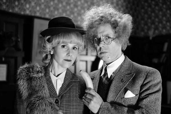 Reece Shearsmith In The Case Of The High Foot. Image shows from L to R: Hilda Stolf (Sally Phillips), Doctor (Reece Shearsmith)