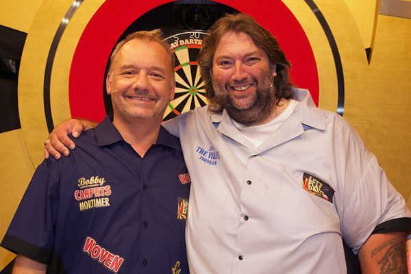 Let's Play Darts. Image shows from L to R: Bob Mortimer, Andy Fordham. Copyright: Zeppotron