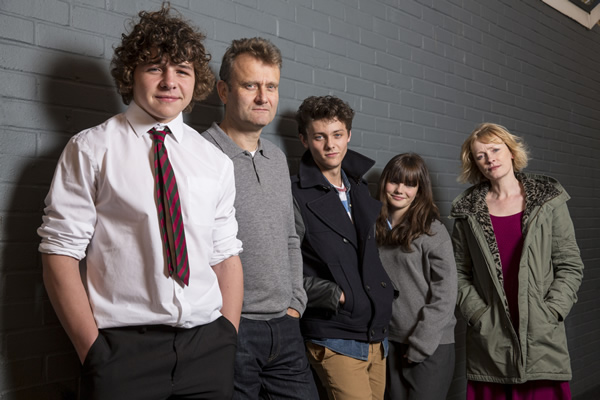 Outnumbered. Image shows from L to R: Ben (Daniel Roche), Pete (Hugh Dennis), Jake (Tyger Drew-Honey), Karen (Ramona Marquez), Sue (Claire Skinner). Copyright: Hat Trick Productions