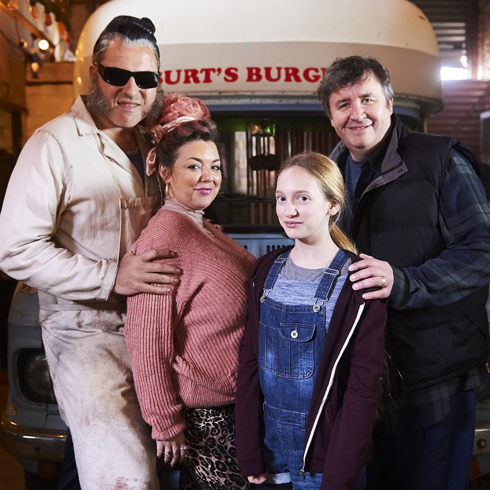 Ratburger. Image shows from L to R: Burt (David Walliams), Sheila (Sheridan Smith), Zoe (Talia Barnett), Gary (Mark Benton). Copyright: King Bert Productions