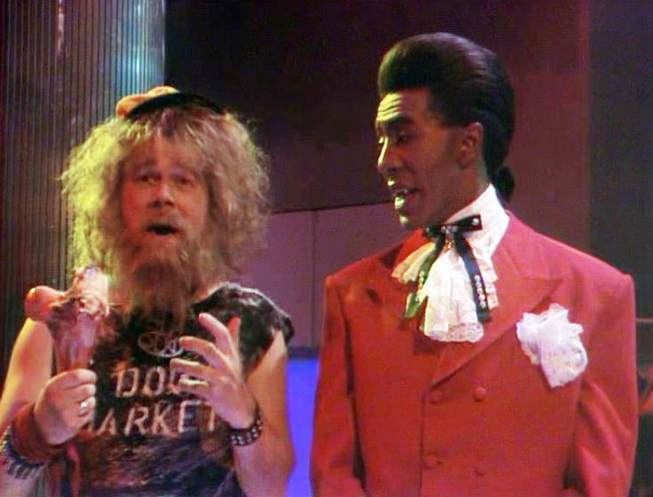 Red Dwarf. Image shows left to right: The Dog (Matt Devitt), Cat (Danny John-Jules). Credit: BBC