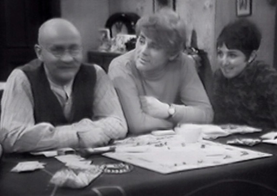 A scene from Monopoly. Image shows left to right: Alf Garnett (Warren Mitchell), Mike Rawlins (Anthony Booth), Rita Rawlins (Una Stubbs). Credit: BBC