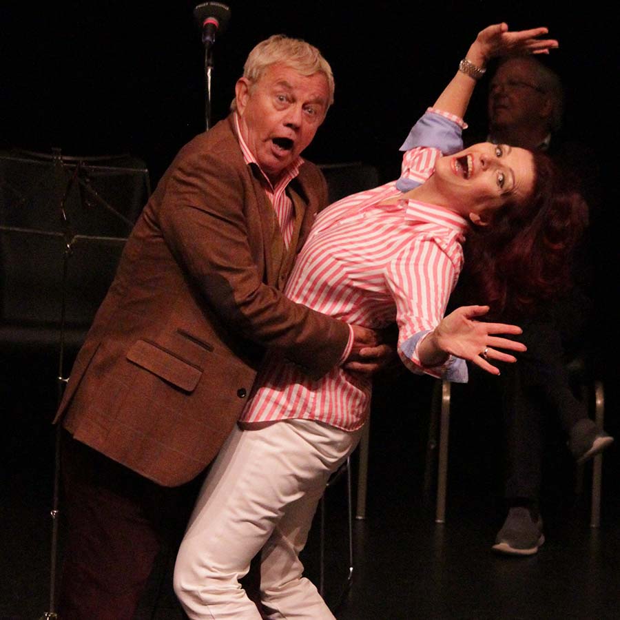 Frazer Hines and Cleo Rocos as Ludicrus Sextus and Suspenda, recording the 2019 Up Pompeii! audio play. Image shows from L to R: Frazer Hines, Cleo Rocos. Copyright: Kim Jones