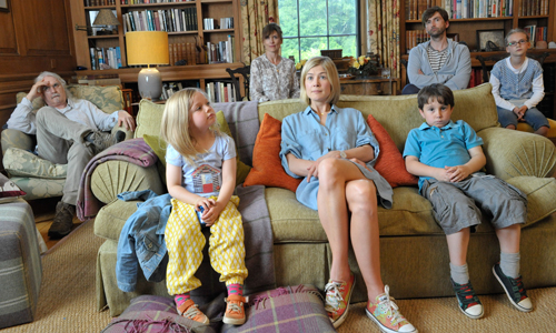 What We Did On Our Holiday. Image shows from L to R: Gordie McLeod (Billy Connolly), Jess McLeod (Harriet Turnbull), Margaret McLeod (Amelia Bullmore), Abi McLeod (Rosamund Pike), Mickey McLeod (Bobby Smalldridge), Doug McLeod (David Tennant), Lottie McLeod (Emilia Jones). Copyright: Origin Pictures / BBC Films