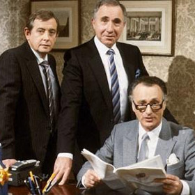 Yes Minister. Image shows from L to R: Bernard Woolley (Derek Fowlds), Sir Humphrey Appleby (Nigel Hawthorne), James Hacker (Paul Eddington). Copyright: BBC