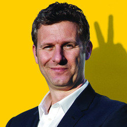 Adam Hills: Happyism. Adam Hills. Copyright: Peter Rogers Productions