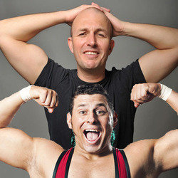 Brendon Burns and Colt Cabana Sit in a Fifty-Seater Around Midnight and Provide the Commentary to Bad Wrestling Matches. Image shows from L to R: Brendon Burns, Colt Cabana