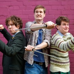 Staple/face are... Going Down Fighting. Image shows from L to R: Sam Nicoresti, Mike Bentley, Tom Burgess. Copyright: BBC