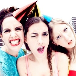 Birthday Girls: Party Vibes. Image shows from L to R: Camille Ucan, Rose Johnson, Beattie Edmondson. Copyright: Talkback