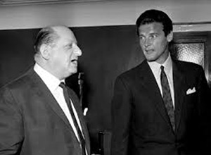 Image shows left to right: Lew Grade, Roger Moore