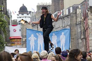 A unicyclist on the Royal Mile during the Edinburgh Festival Fringe