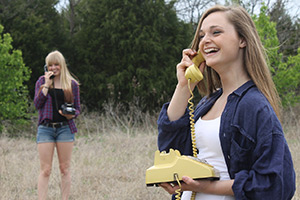 Two women talking on the phone