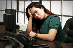 Woman sitting at computer