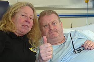 Raymond Mearns and his partner Annie McKeown pictured in hospital after he suffered a stroke. Image shows left to right: Annie McKeown, Raymond Mearns