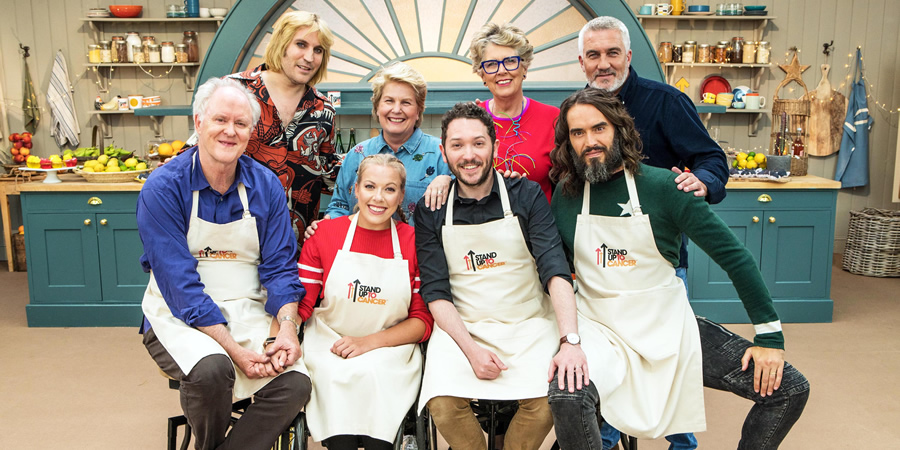 The Great Celebrity Bake Off for Stand Up to Cancer 2019. Image shows from L to R: John Lithgow, Noel Fielding, Hannah Cockroft, Sandi Toksvig, Jon Richardson, Prue Leith, Russell Brand, Paul Hollywood. Copyright: Channel 4 Television Corporation