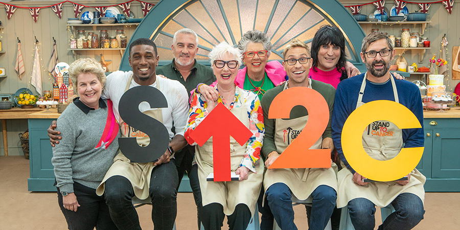 The Great Celebrity Bake Off for Stand Up To Cancer 2020. Image shows from L to R: Sandi Toksvig, Ovie Soko, Paul Hollywood, Jenny Eclair, Prue Leith, Russell Howard, Noel Fielding, Louis Theroux. Copyright: Channel 4 Television Corporation