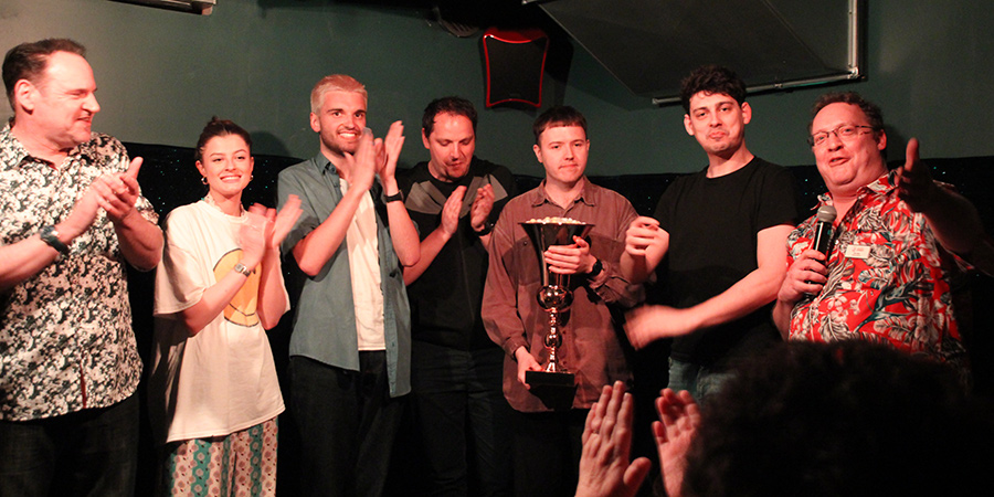 Bath Comedy Festival New Act Of The Year 2022. Image shows from L to R: Geoff Whiting, Freya Mallard, Will Owen, Hubert Mayr, Adam Flood, Matt Richardson, Nick Steel. Copyright: Kerrianne Gauld