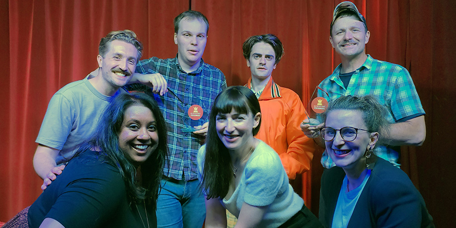 Image shows from L to R: Benjamin Lovell, Suchandrika Chakrabarti, Bennet Kavanagh, Liz Guterbock, Luke Rollason, Brandon Burke, Felicity Ward