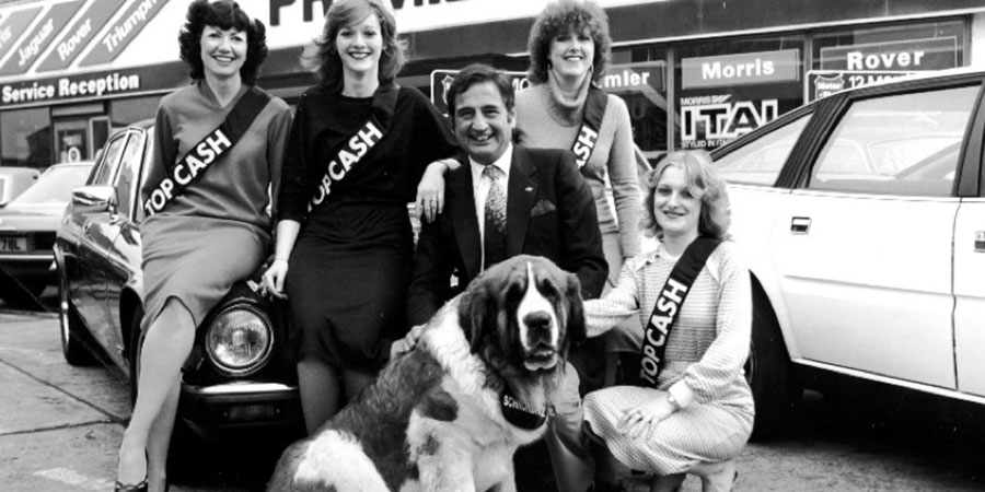 Bernie Winters and Schnorbitz the dog with a quartet of promotional girls, marketing car sales and petrol in the 1980s