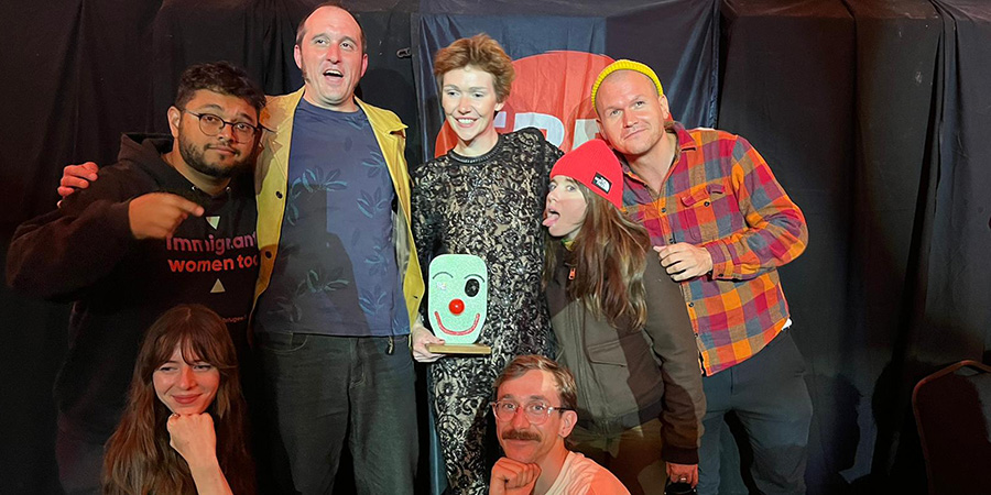 Comedians' Choice Awards 2024 Best Show nominees. Image shows left to right: Chelsea Birkby, Sid Singh, Phil Ellis, Elf Lyons, Rob Copland, Natalie Palamides, Furiozo