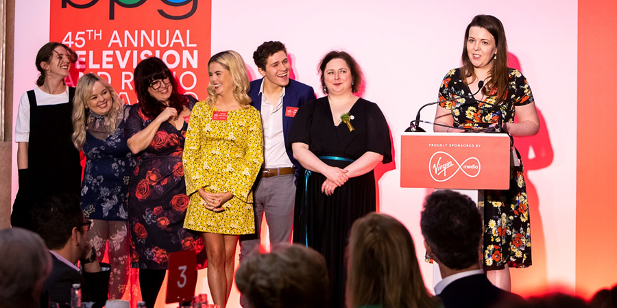 Derry Girls win at the BPG Awards 2019. Image shows from L to R: Louisa Harland, Nicola Coughlan, Liz Lewin, Saoirse-Monica Jackson, Dylan Llewellyn, Siobhán McSweeney, Lisa McGee. Copyright: BPG / Virgin Media