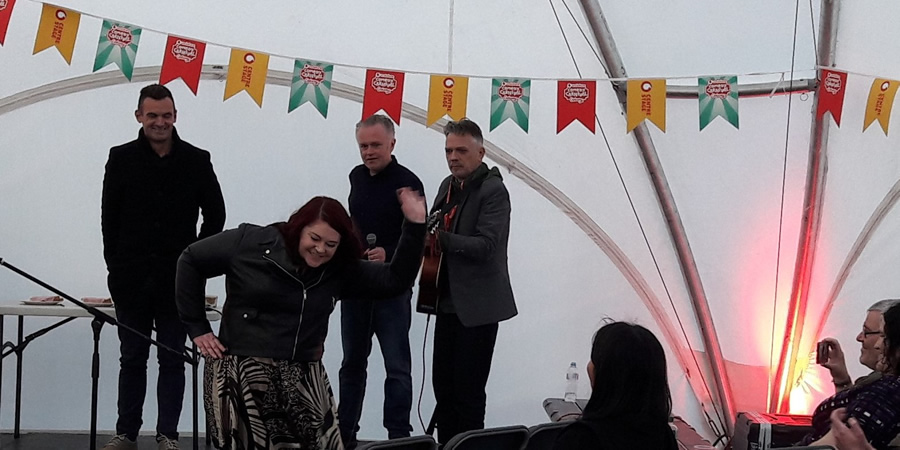 Joe Rooney and Patrick McDonnell (on the right) get punters dancing in the Galway Comedy Festival tent. Copyright: Si Hawkins / Hazelgee