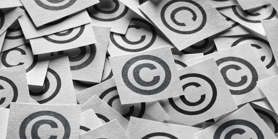 Lots of copyright symbols on pieces of card. Credit: Pixabay