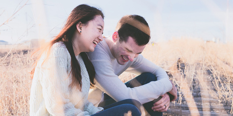 A couple laughing