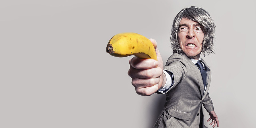 A man holding a banana