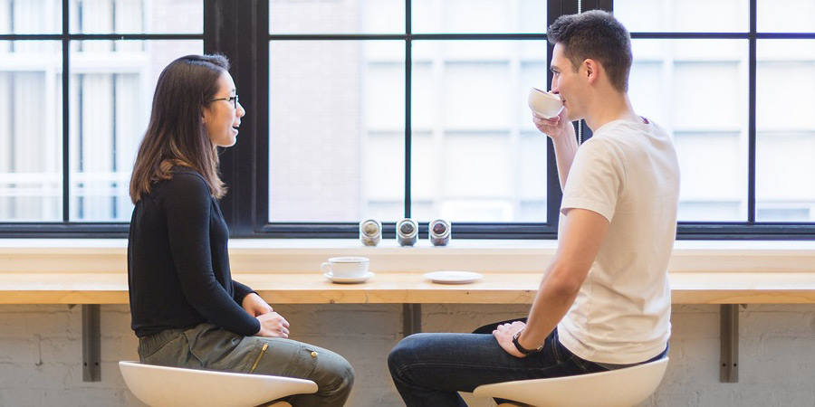 Picture of two people meeting