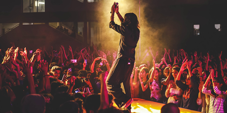 A performer and their cheering crowd