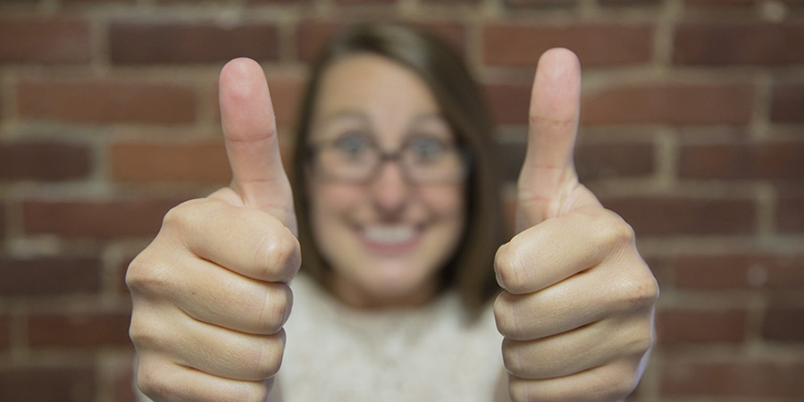 Generic picture of a woman with her thumbs up
