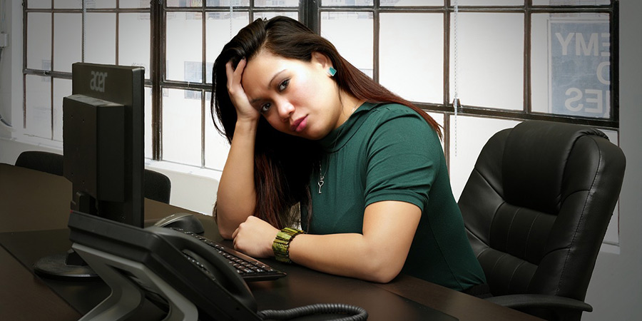 Woman sitting at computer