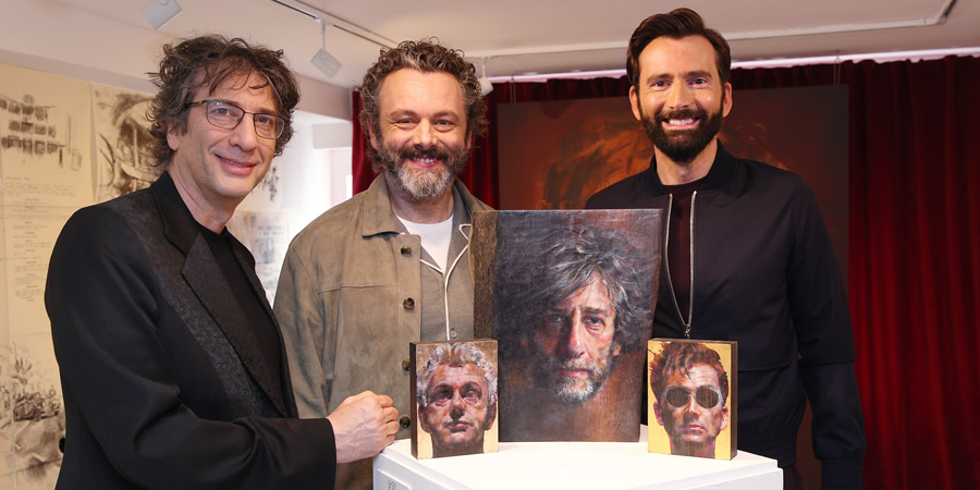 Good Omens. Image shows from L to R: Neil Gaiman, Aziraphale (Michael Sheen), Crowley (David Tennant)