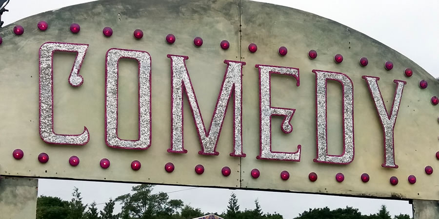 Comedy sign at Latitude Festival. Copyright: Si Hawkins