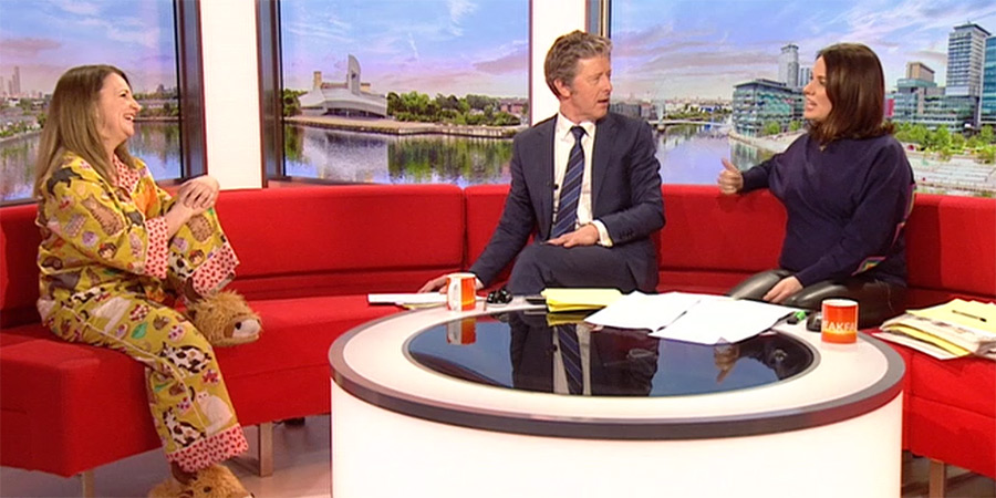 BBC Breakfast - 18th February 2023. Image shows left to right: Lucy Porter, Charlie Stayt, Nina Warhust