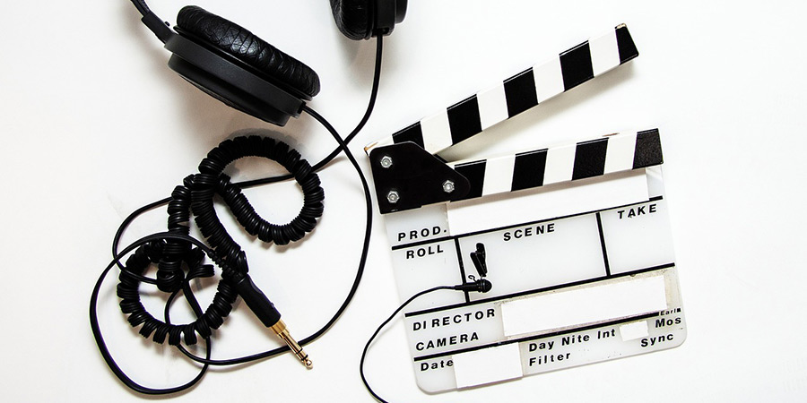 Clapperboard and headphones