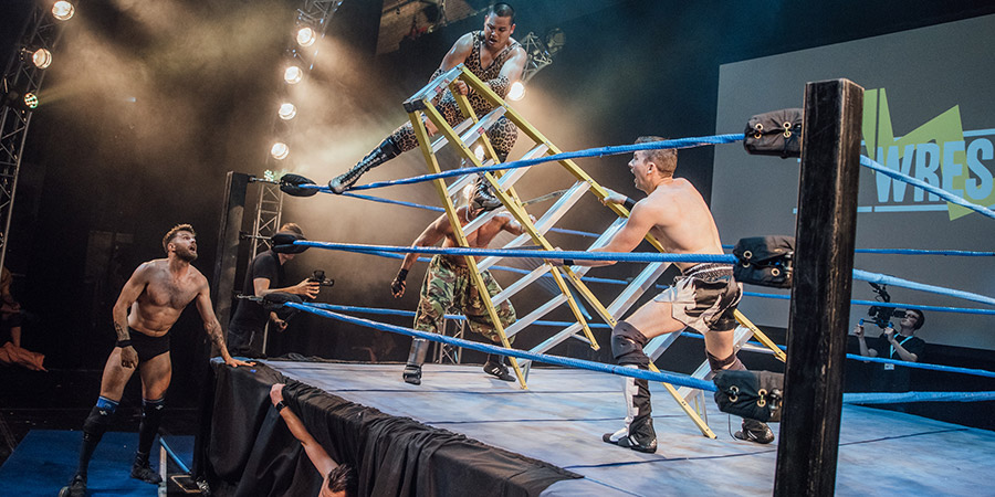 Joel Dommett watches a ladder being positioned at The Wrestling 2017. Copyright: David Monteith-Hodge