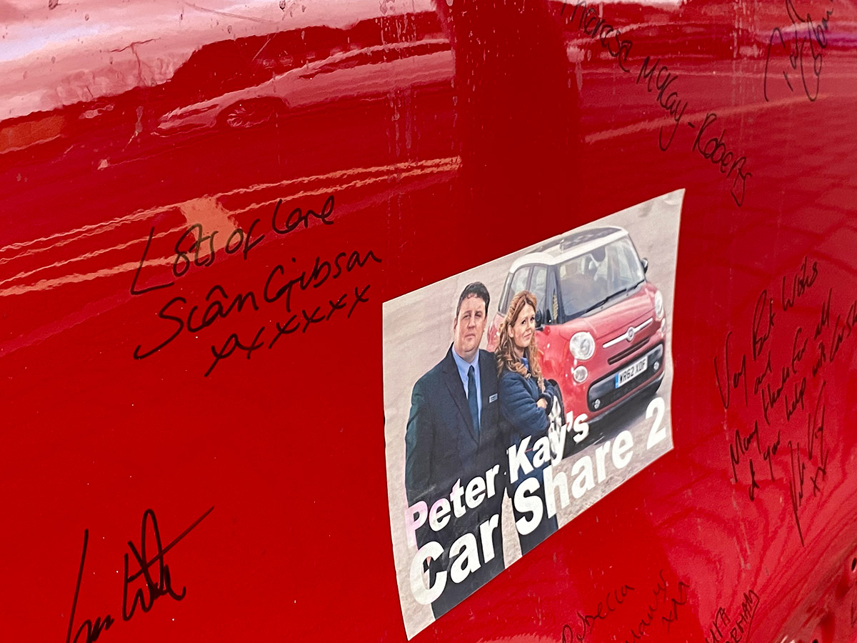 Signed car door close-up on Sian Gibson's signature