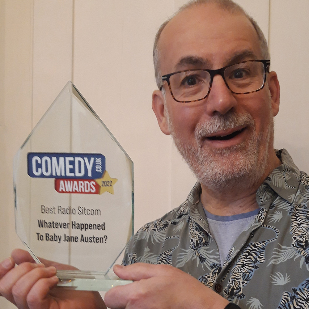 Writer David Quantick with his Comedy.co.uk Award 2022 for Best Radio Sitcom. David Quantick