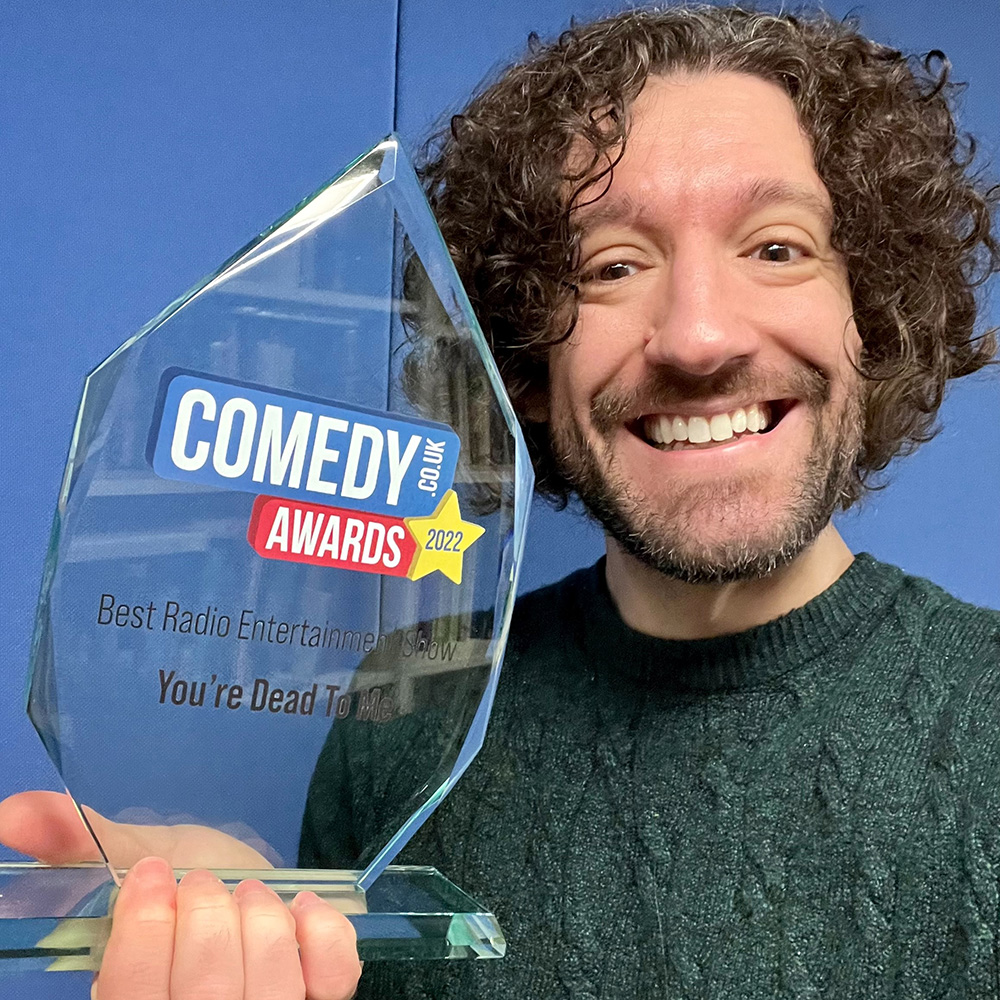 Greg with his Comedy.co.uk Award 2022 for Best Radio Entertainment Show. Greg Jenner