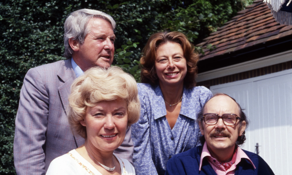 Eric Morecambe and Ernie Wise with their wives, Joan Bartlett and Doreen Wise in the garden of Eric Morecambe's home in Harpenden, 05/08/1979. Copyright: BBC History